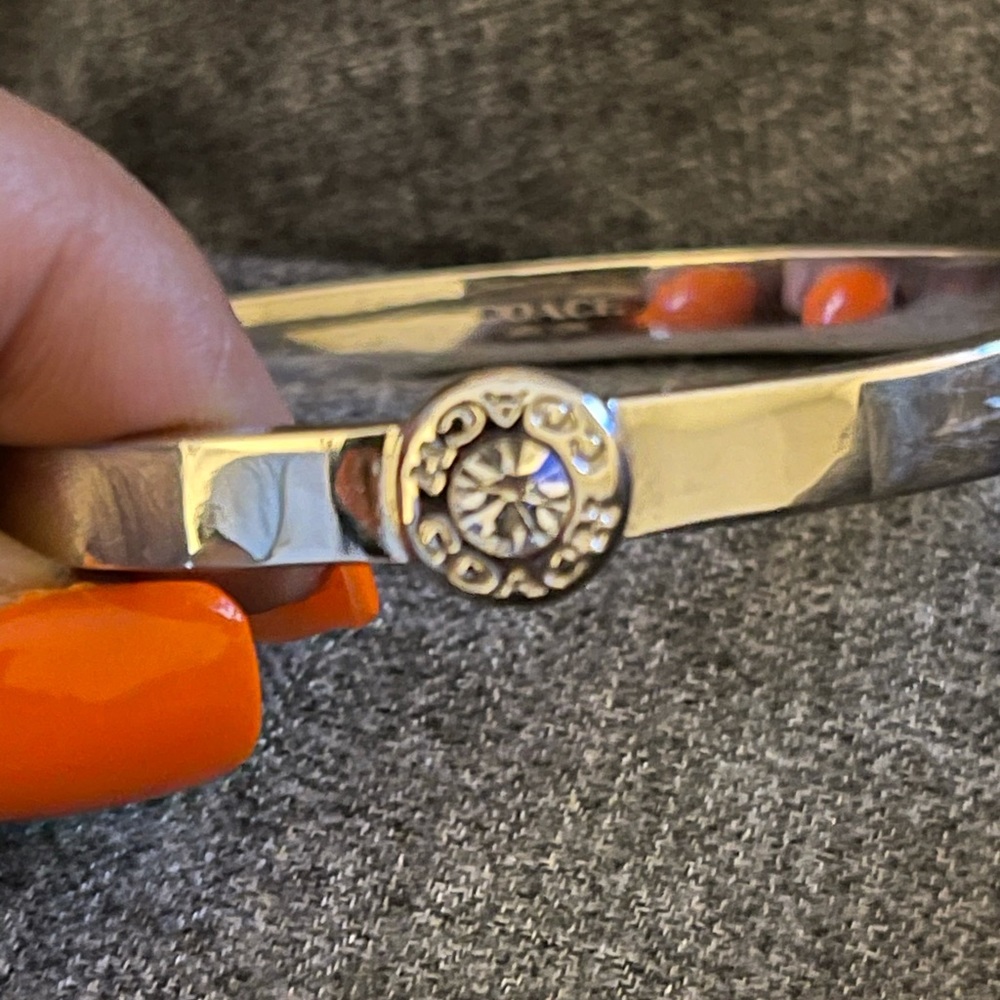 Authentic Coach silver oval bangle bracelet